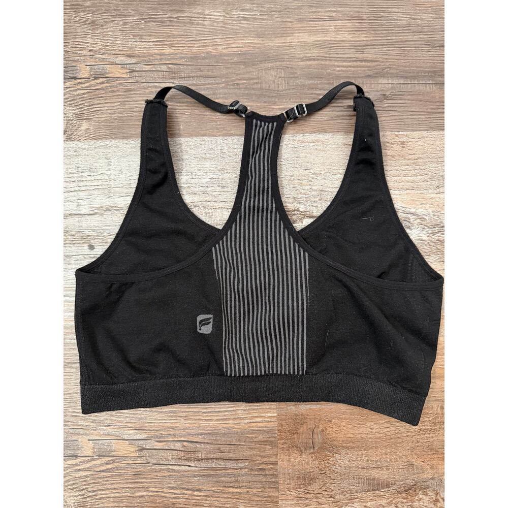 Fabletics racerback sports bra in black with grey stripes size Large